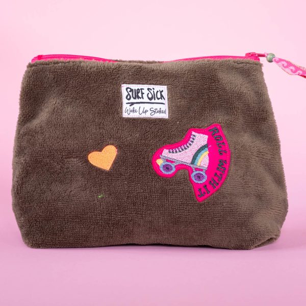 Toilettasje met patch rollerskate